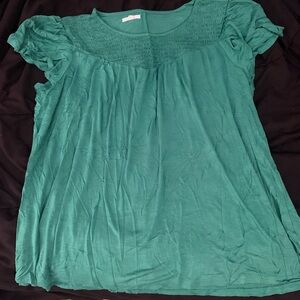 Green Maurice’s shirt